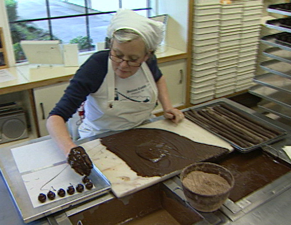 Cook making chocolate