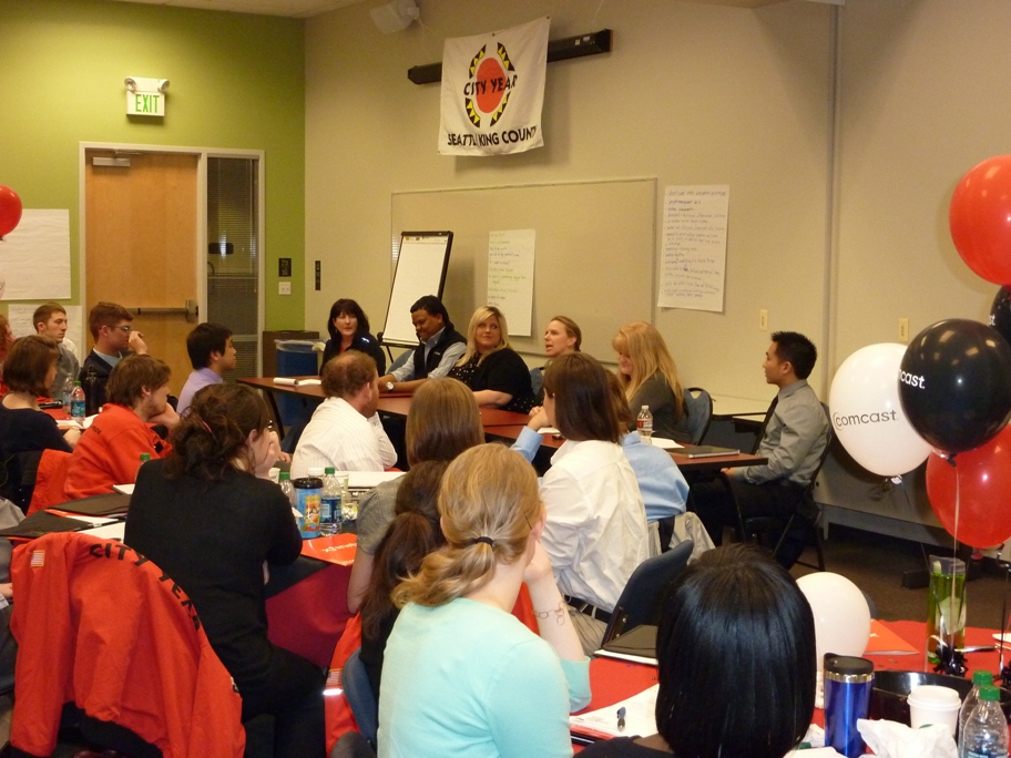 Comcast employees speak to City Year corps members about careers