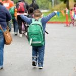 child with backpack