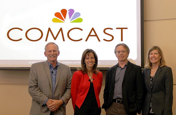 photo of the four people at the news conference