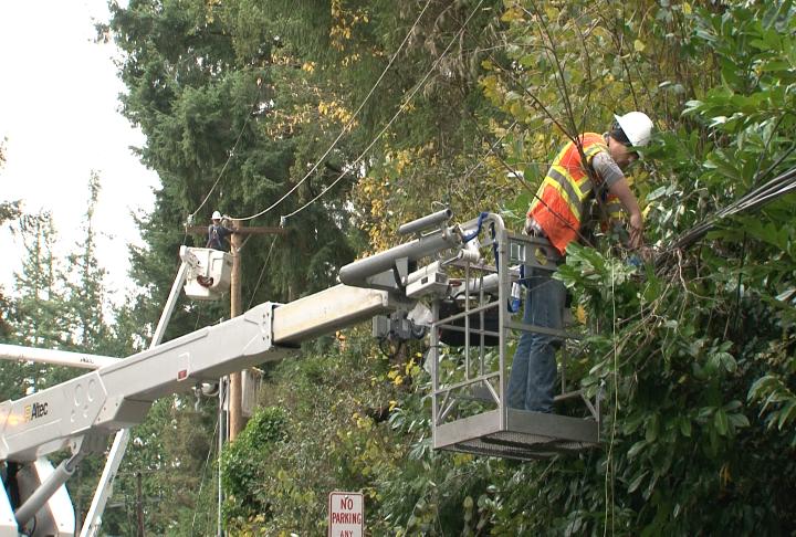 Comcast tech at work at storm repair