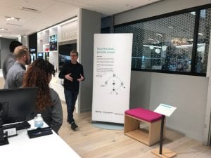 Living Computers: Museum + Labs Curator Aaron Alcorn describes Twitter Bench at Xfinity retail store in Bellevue