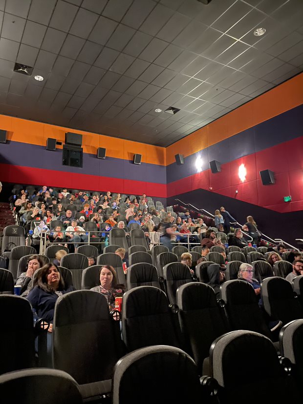 Children in the theater at the Jurassic World screening.