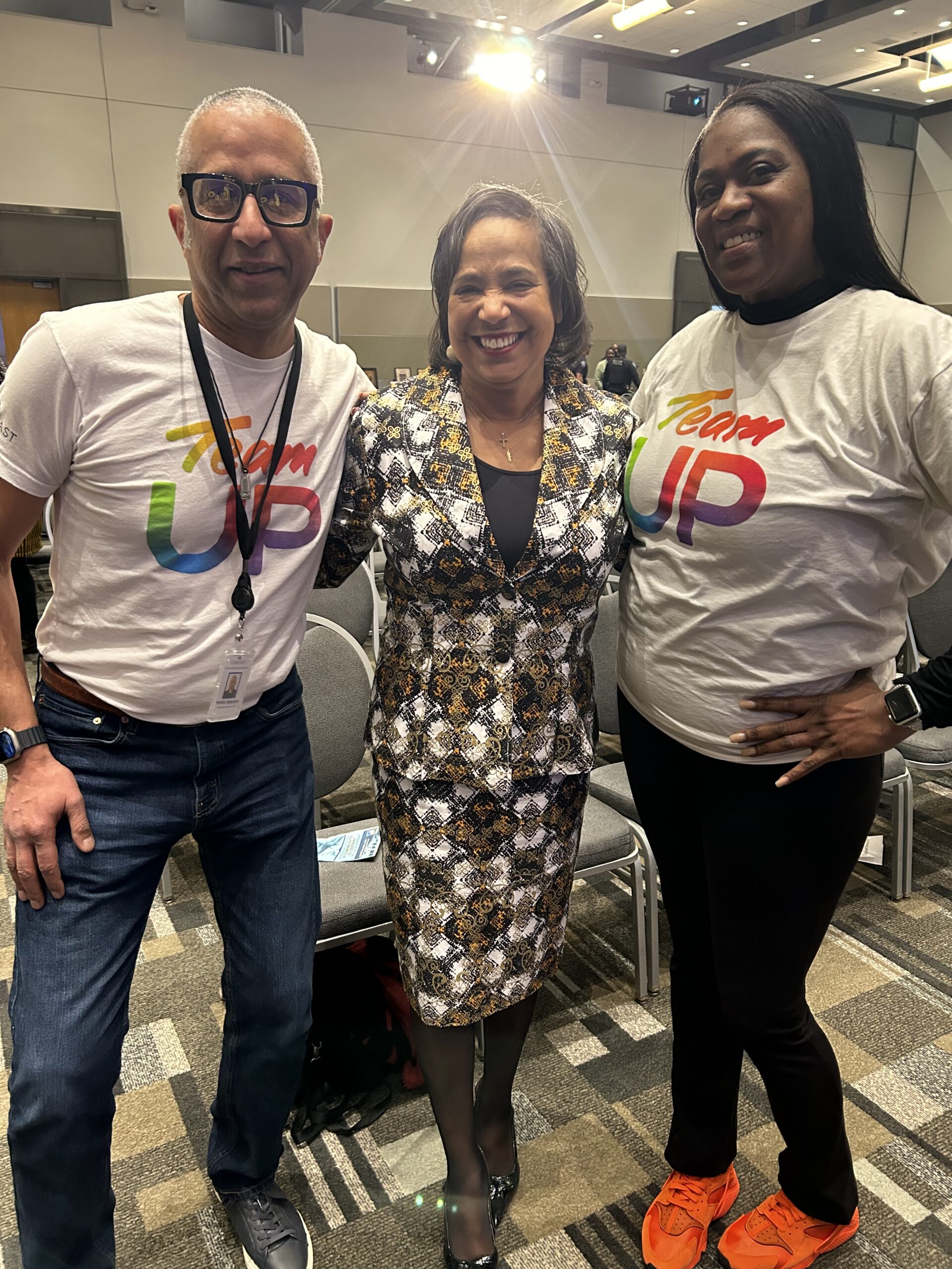 Comcast employees with Tacoma Mayor Victoria Woodyards.