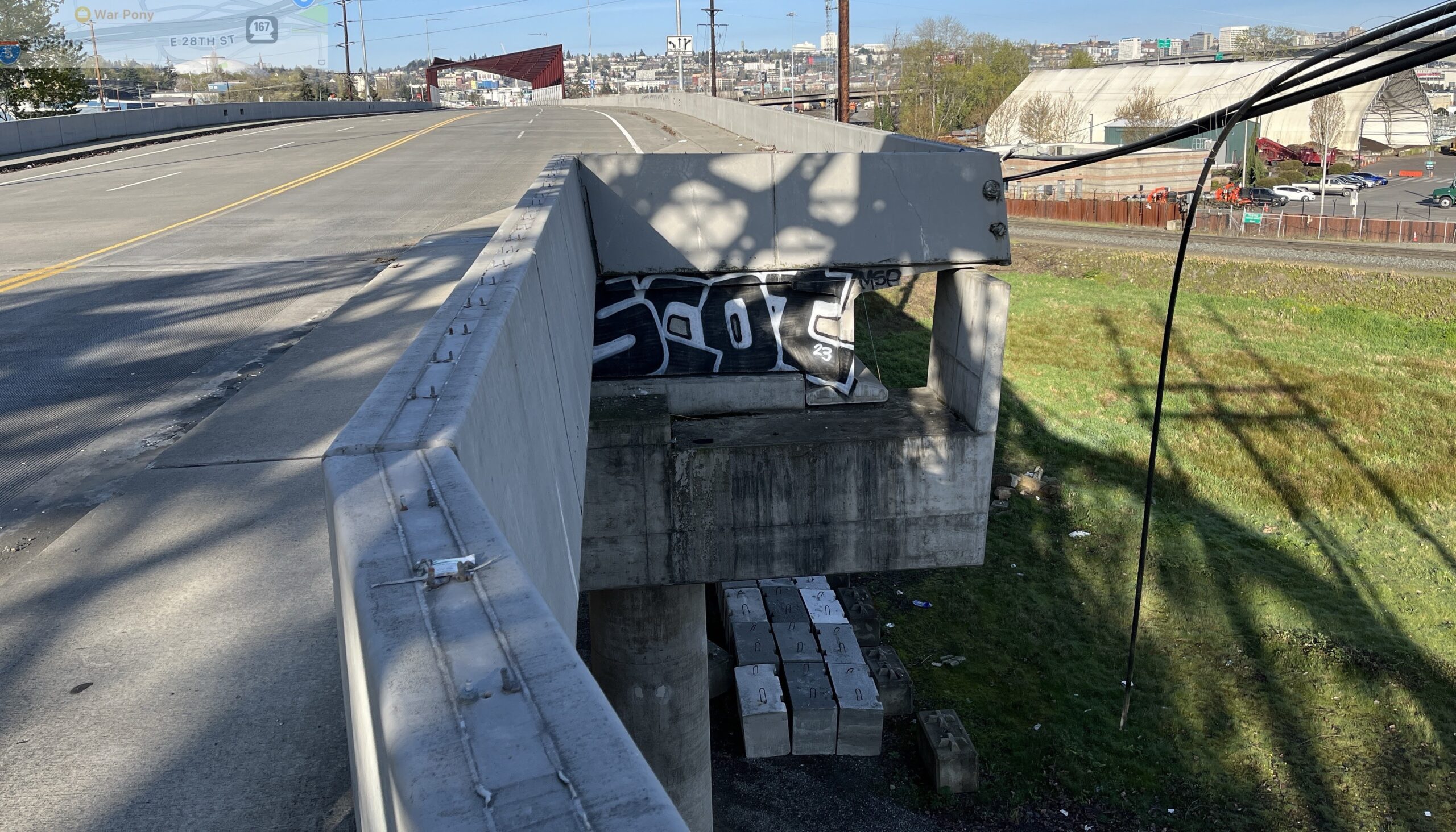 A bridge with a cut wire next to it.