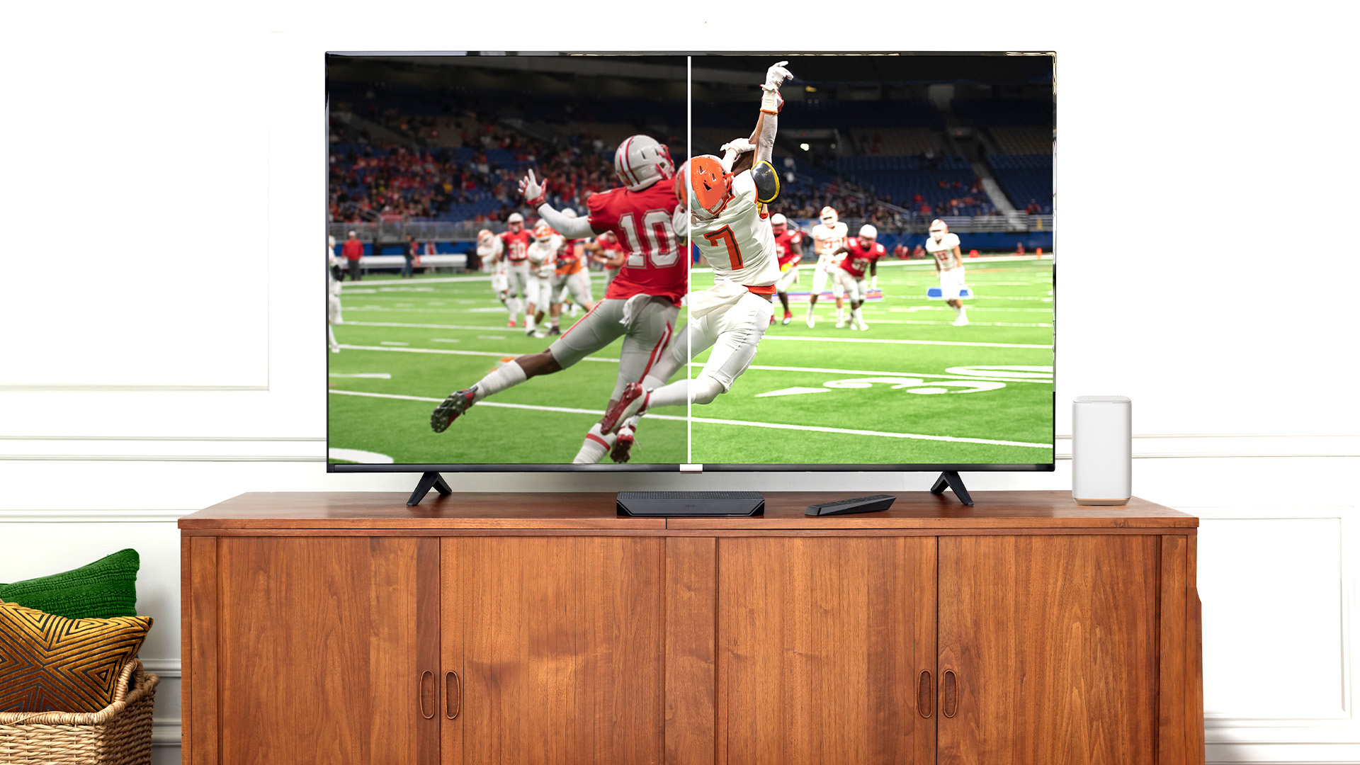 Football players on a TV.