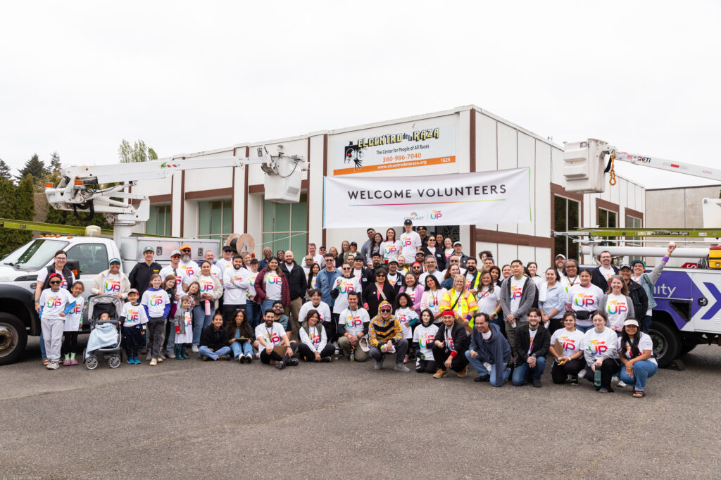 Comcast volunteers in front of El Centro de la Raza in Federal Way.