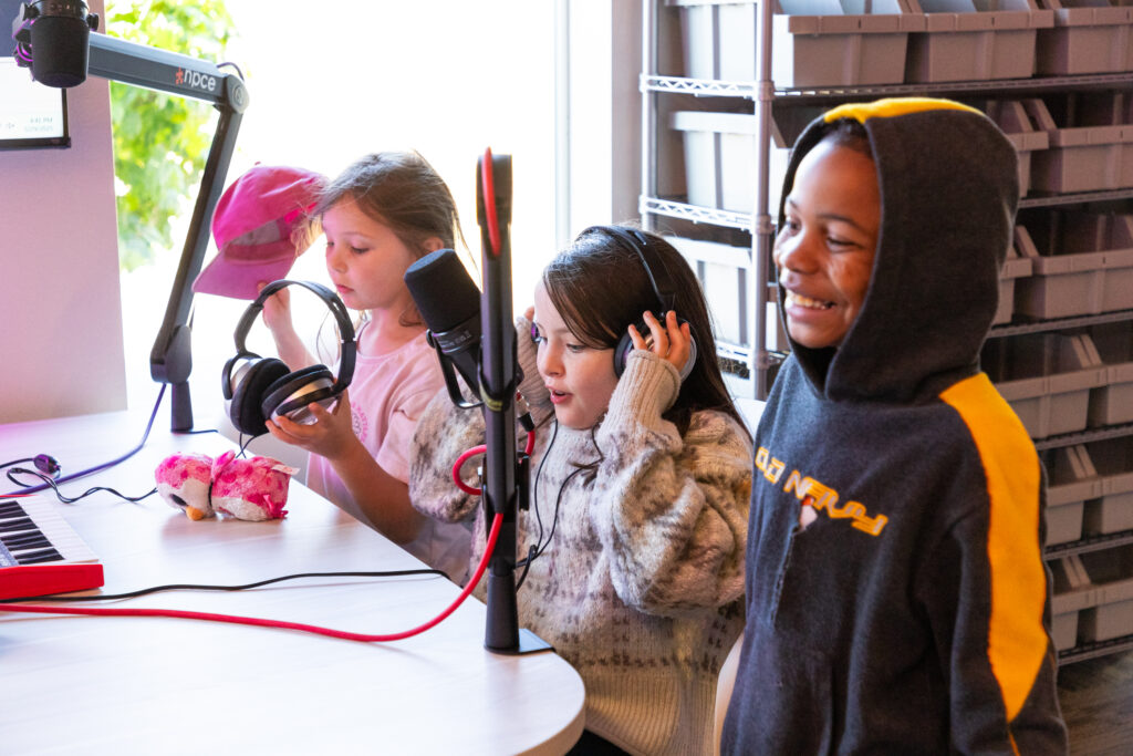 Boys & Girls Club members in the podcast studio in the Lift Zone.
