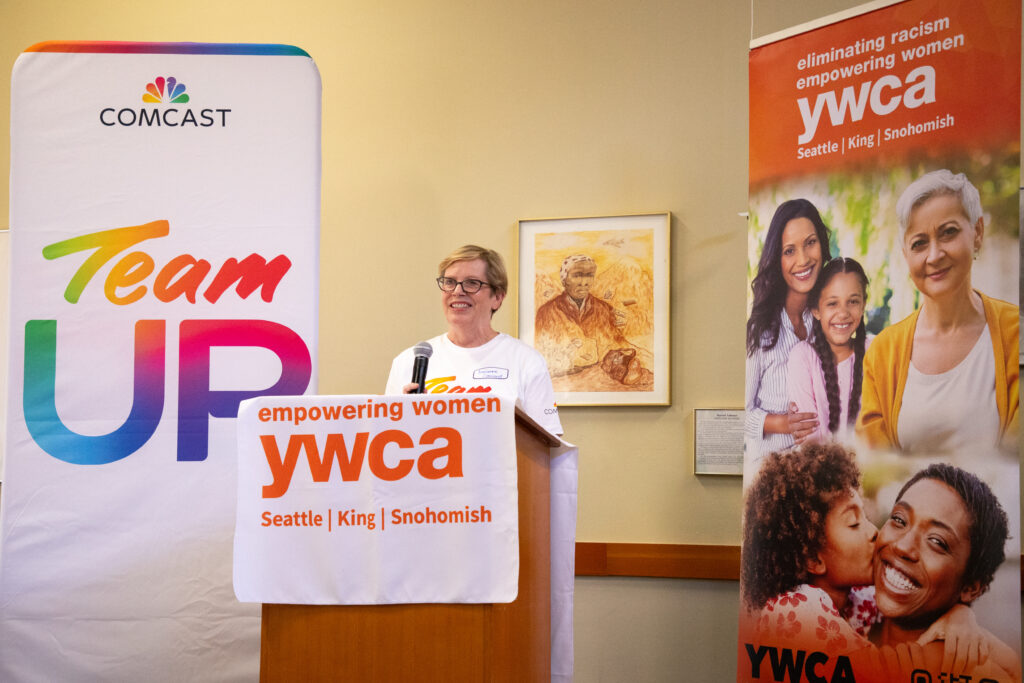 Comcast's Marianne Bichsel speaks at the YWCA.