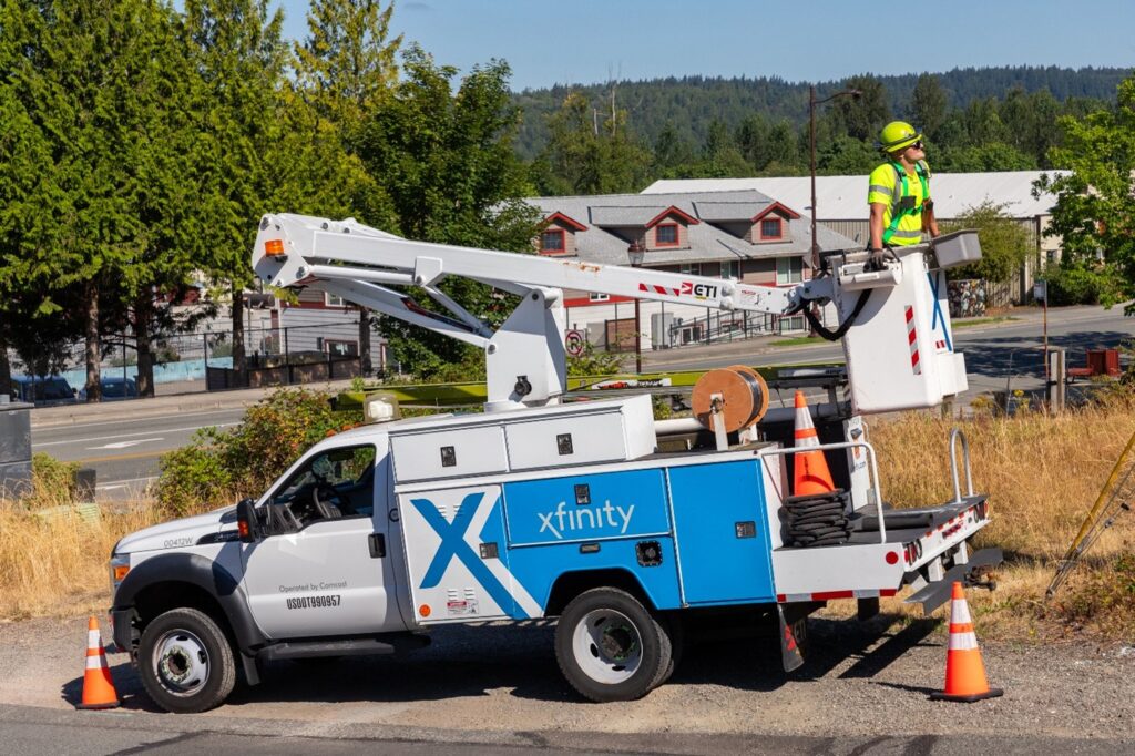 A Comcast Xfinity truck and a technician in Duvall.