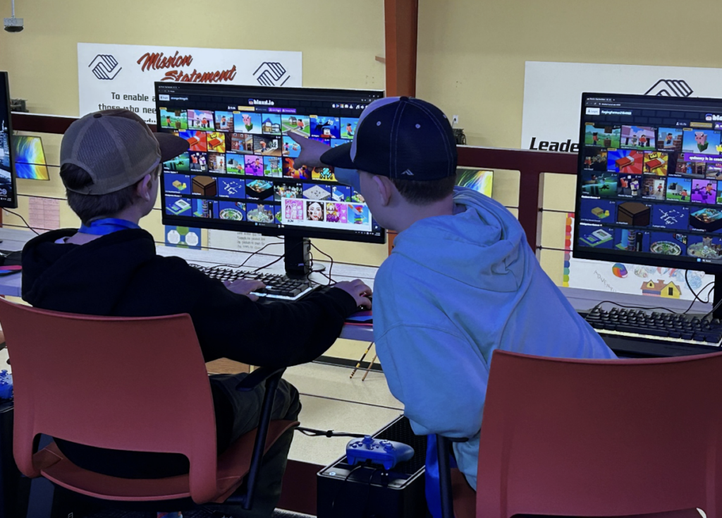 Young children looking at a computer screen
